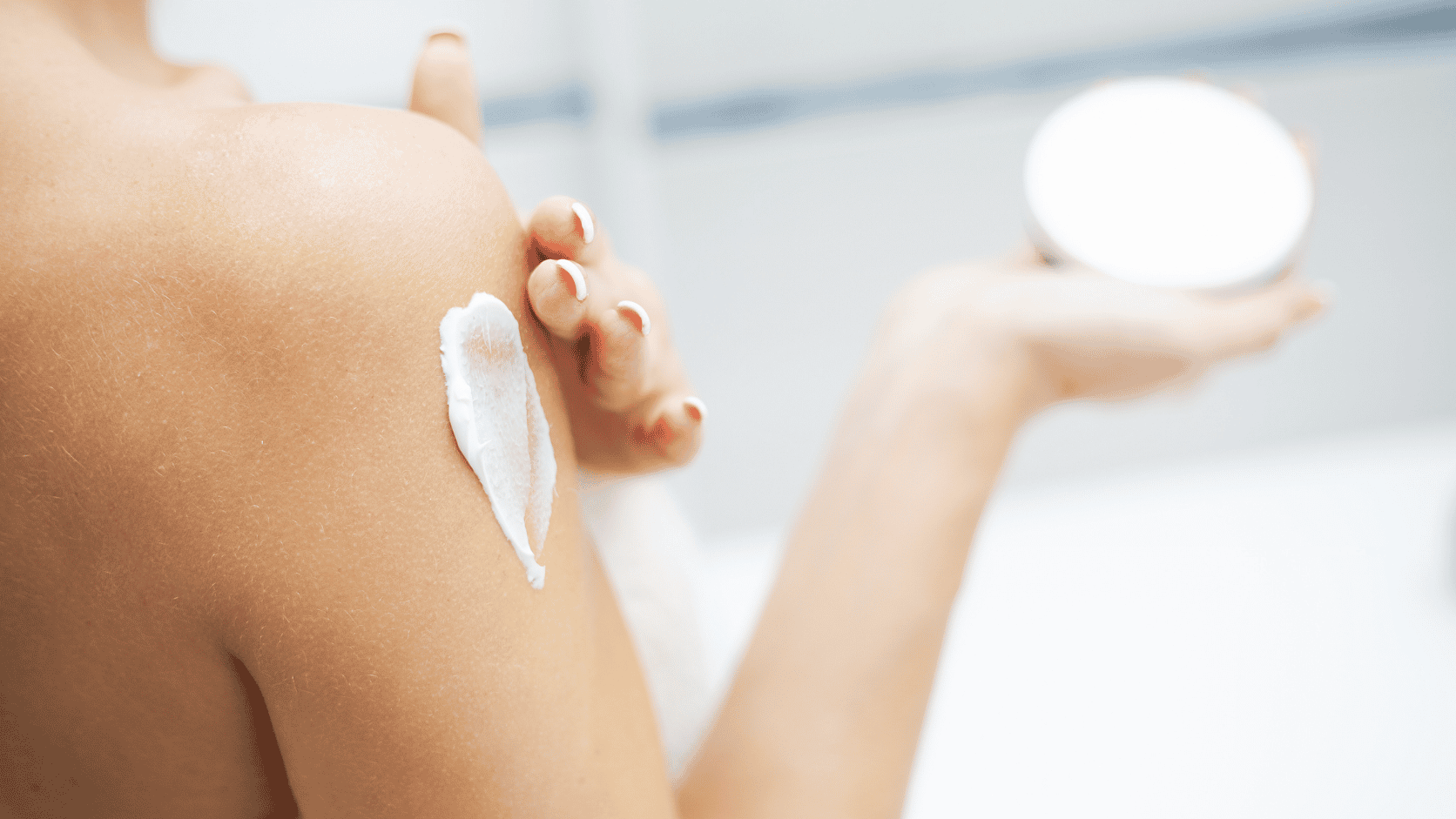 Body cream applied to dry skin, illustrating body butter vs lotion for very dry skin and rough patches